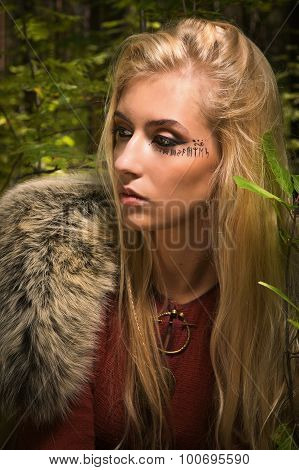 Scandinavian  Girl With Runic Signs In A Wood