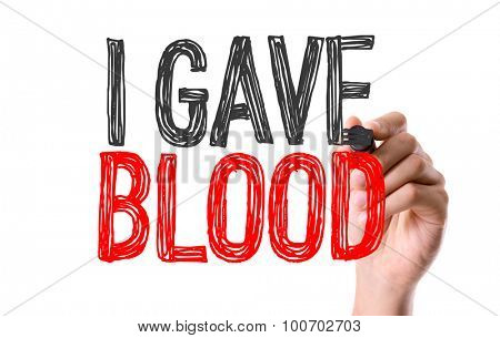 Hand with marker writing the word I Gave Blood