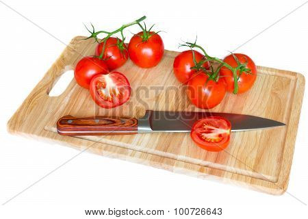 Tomatoes on the board.