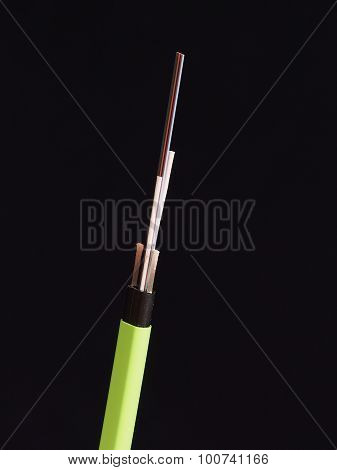 Green Nylon coated fiber optic cable with stripped and exposed fibers