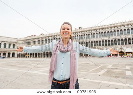 Happy Woman Tourist Rejoicing On St. Mark's Square