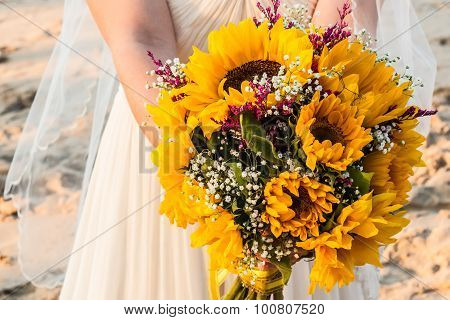 Bride on Beach with Bouquet