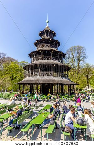 People Enjoy The  Biergarten Near Chinese Tower