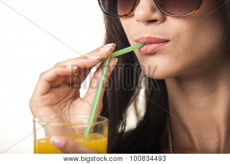 Pretty lady with the glass close up.