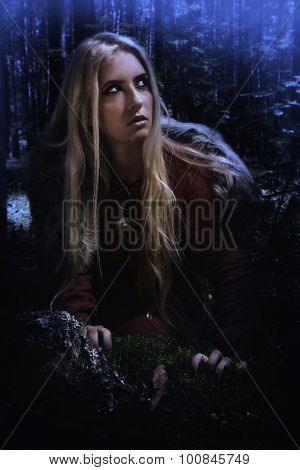 Scandinavian Girl In The Night Forest