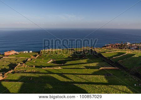 Green Grass Terraces With Blue Sky And Sea-spain