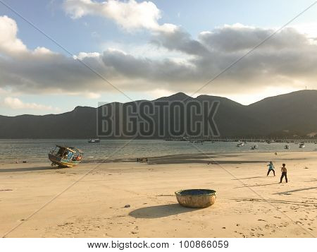 Old Fishing Boat At The Beach In Sunset