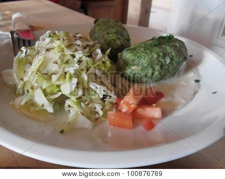 Typical South Tyrolean Dish Of Canederli Pasta With Sauerkraut