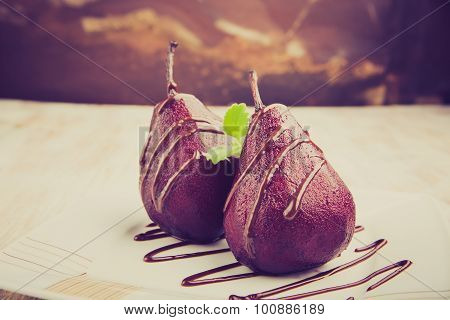 Vintage Photo Of Pears Cooked In Red Wine With Chocolate