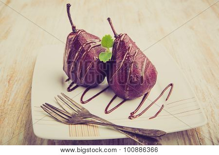 Vintage Photo Of Pears Cooked In Red Wine With Chocolate