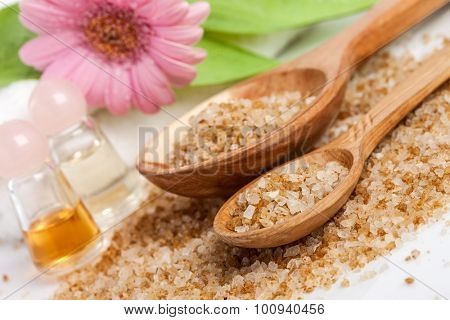 Spa essentials (bath salt in a spoon and flower)