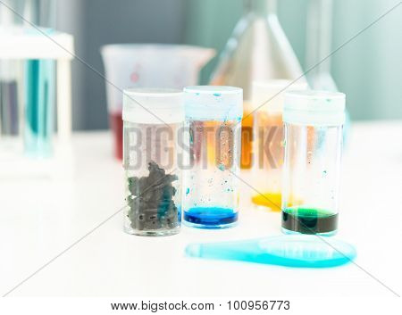 Pharmacy and chemistry theme. Test glass flask with solution in research laboratory