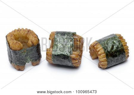 Sushi-shaped, Small Pastry Pieces, Wrapped With Seaweed, Seaweed, And A Strong Fishy Taste