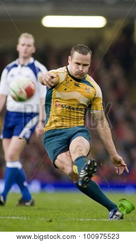 CARDIFF, WALES. 28 NOVEMBER 2009.  Matt Giteau playing for Australia kicking a conversion while playing in the Invesco Perpetual International Rugby Union match between Wales and Australia