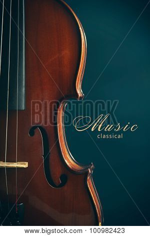 Classical violin on dark blue background