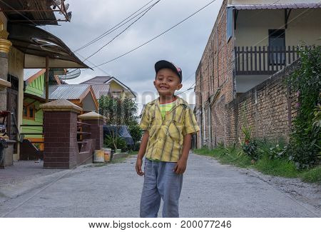 BERASTAGI INDONESIA 15 MAY 2017 : Indonesian boy on the street of Berastagi city Northern Sumatra.