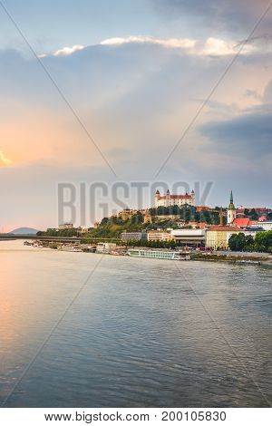 Cityscape of Bratislava Slovakia at Sunset as Seen from a Bridge over Danube River Towards Old Town of Bratislava.