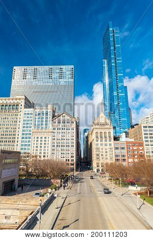Chicago - March 2017, IL, USA: Skyscrapers and office buildings in downtown Chicago, view from Nichols Bridgeway near Millennium Park