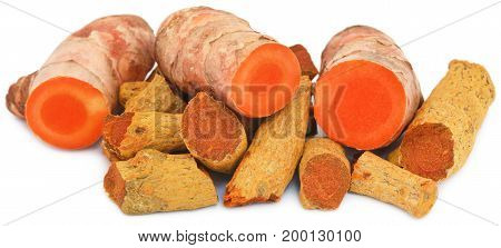 Closeup of Fresh turmeric over white background
