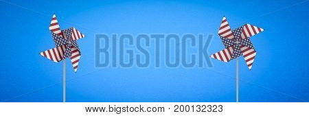 Digital composite of USA wind catchers in front of blue background