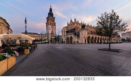 The main square of Krakow Poland. Europe in the early morning in summer time.
