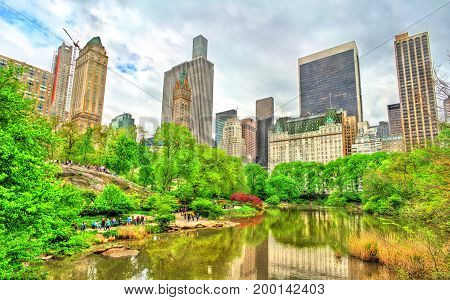 Central Park with the Pond and Manhattan Skyline - New York City, United States
