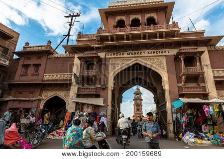 JODHPUR RAJASTHAN INDIA - MARCH 04 2016: Wide angle picture of Sadar Market Gate in Jodhpur the blue city of Rajasthan in India.