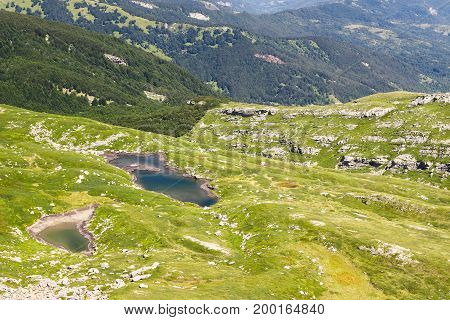 a sunny day in appennini show a beautiful landscapes of glacial lakes