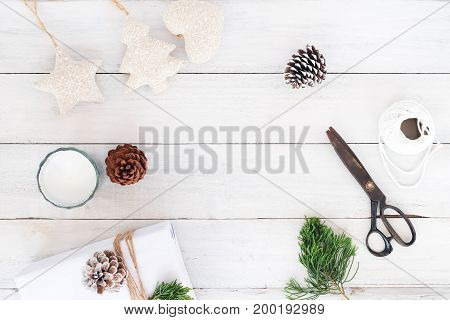 Christmas and New Year background with decorations ornament rustic on white wood table. Creative Flat layout and top view composition