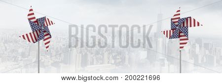 Digital composite of USA wind catchers in front of city