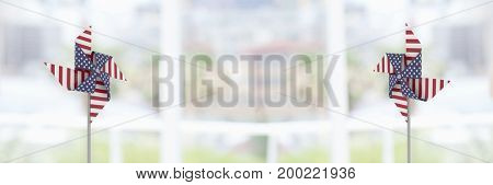 Digital composite of UUSA wind catchers in front of blurry background