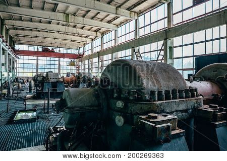 Large machines and equipment at an abandoned factory in the city of Efremov, Russia