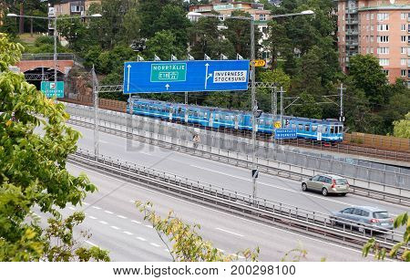 Solna Sweden - July 28 2016: The Stocksund bridges with road number E18 and the train line Roslagsbanan north of Stockholm.