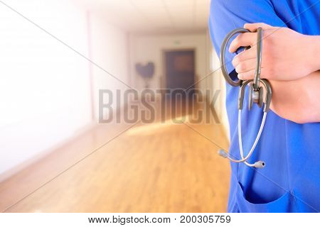 doctor fisician holding stethoscope hands closeup background copyspace