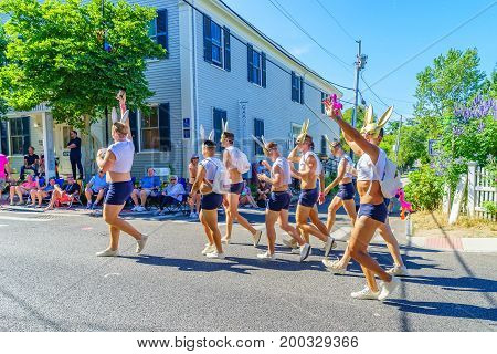 Provincetown Massachusetts US August 17 2017 People walking in the 39th Annual Provincetown Carnival Gods and Goddess Parade on Commercial Street