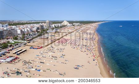Aerial. The amazing beaches of Monte Gortdo, taken from the sky. View of the river Guadiana.