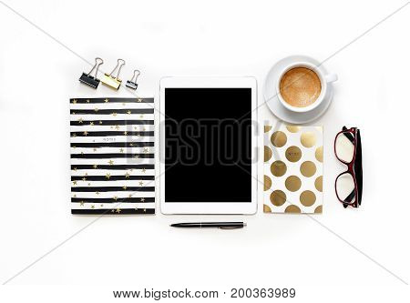Flat Lay Photo Of Office White Desk With Tablet, Keyboard And Gold Notebook Copy Space Background