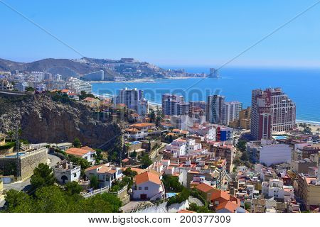 an aerial view of Cullera, in the Valencian Community, Spain, which is a popular beach tourist destination