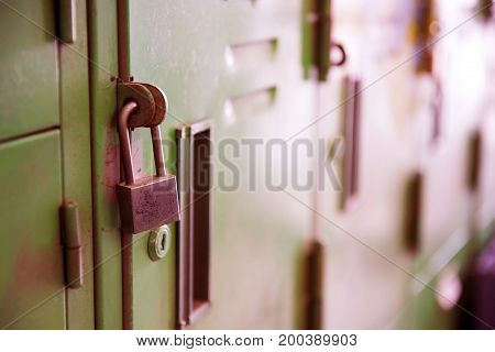 Old lock on the Locker. lock on the door of an old Locker vintage style close-up focus on lock.