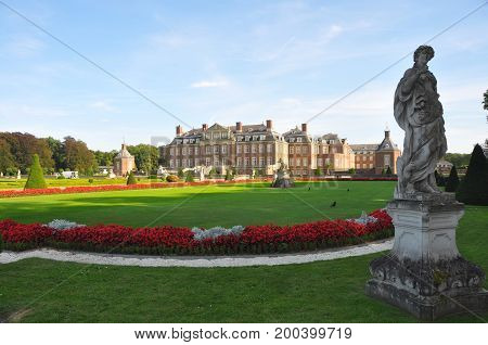 Exterior view of Wasserschloss Nordkirchen with garden in Germany