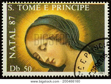 Moscow Russia - August 17 2017: A stamp printed in Sao Tome and Principe shows painting of Madonna by Carlo Dola series "Christmas - Madonna Paintings" circa 1987