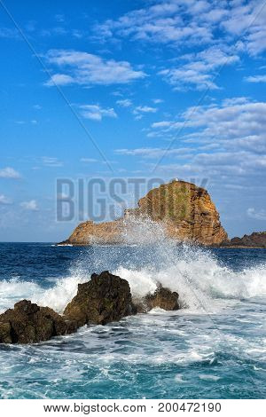Lighthouse And Rock In Porto Moniz In Madeira