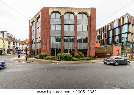Northampton, UK - Aug 09, 2017: Cloudy rainy day view of Walter Tull House in Northampton Town Centre.