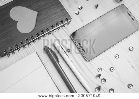 Mobile phone notebook pens pushpin black and white frame