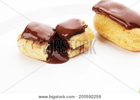 Traditional French Dessert. Eclair With Chocolate Icing. Pastery Concept