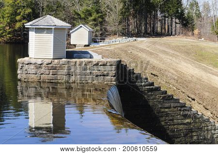 Utility buildings at edge of Barden Reservoir waterfall