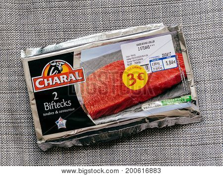 PARIS FRANCE - APR 29 2017: Biftecks packaged in protective packaging made by the French meat producer Charal with special price of 3 Euros instead of 5 Euro. Charal is part of the groupe Bigard.