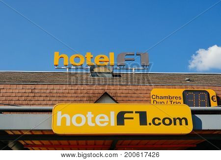PARIS FRANCE - APR 28 2017: Hotel Formula 1 signage on the roof of a cheap hotel. Hotel Formule 1 or hotelF1 in France is an international chain of 