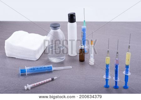 Shots prepare for the vaccination in flu time. Injections on table