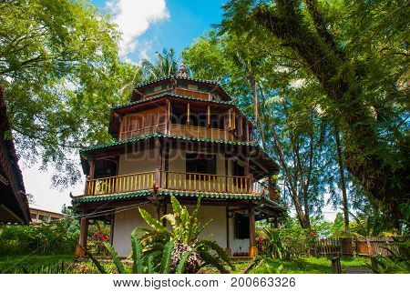 Traditional Wooden Houses In The Kuching To Sarawak Culture Village. Malaysia
